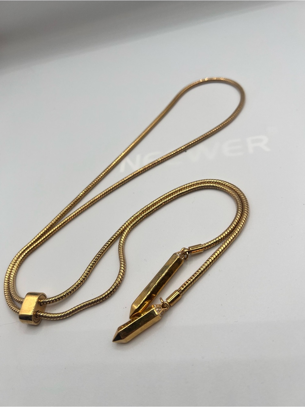 Gold pull-string necklace - Picture 5 of 6